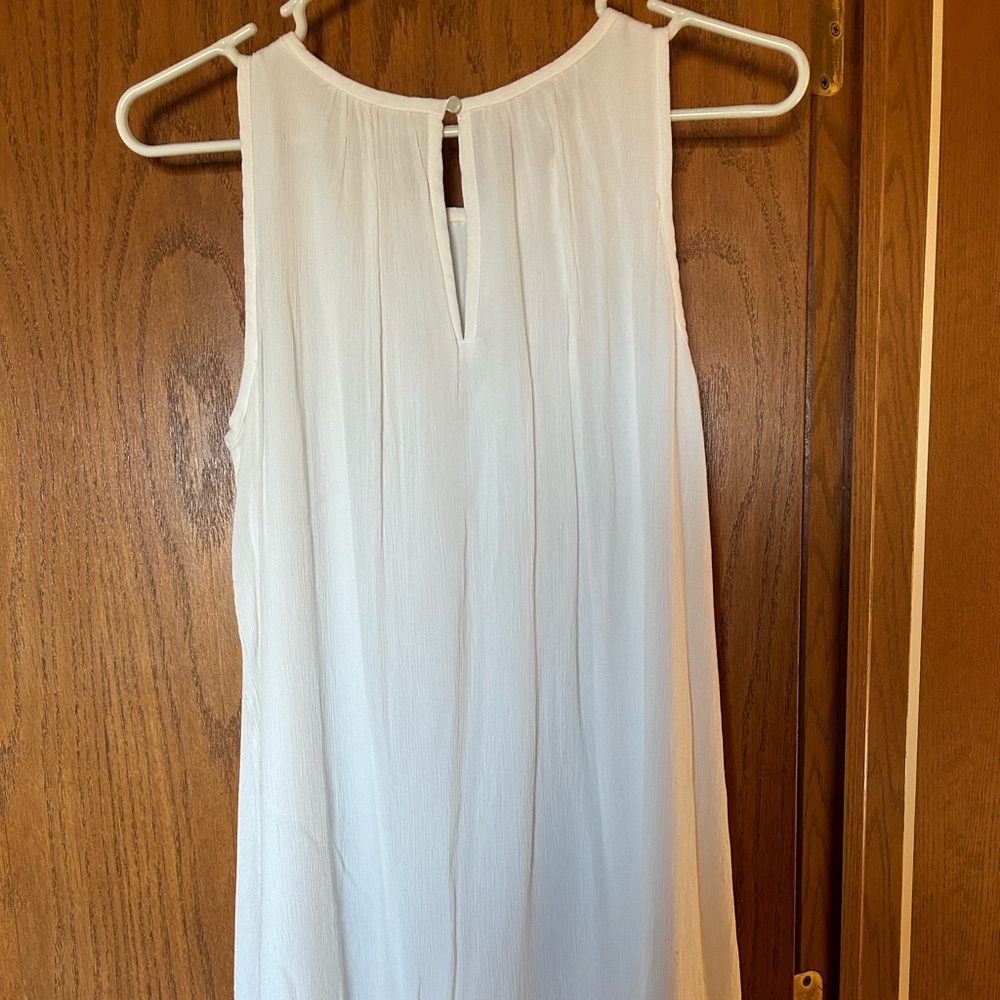 Sleeveless white summer dress, size small.